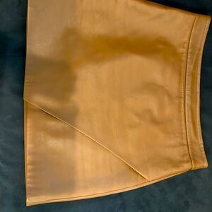 Lamb skin leather mini skirt.